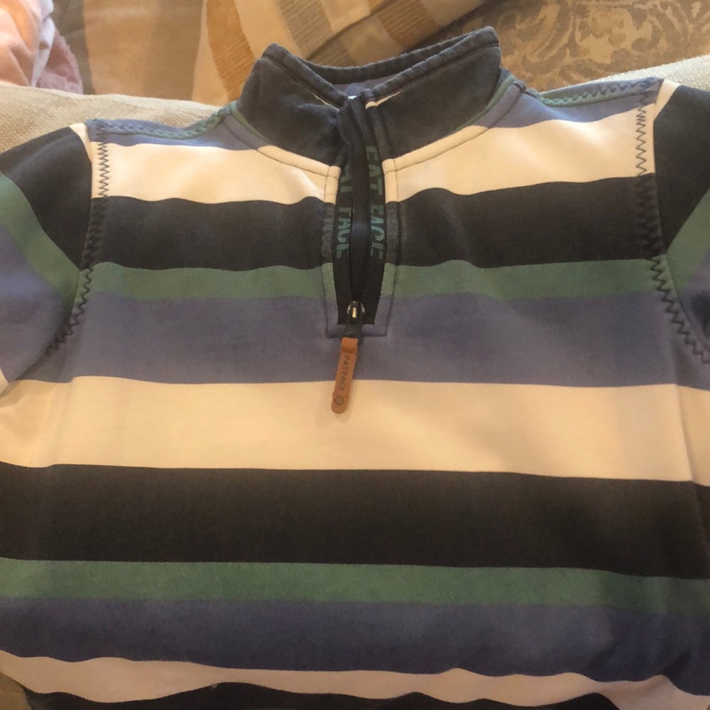 Boys size 8/9 quarter zip striped pull over.